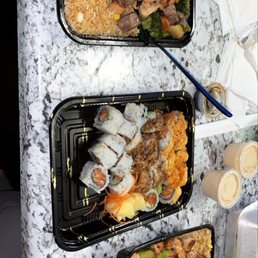 Generous serving of chicken and steak hibachi, 3 combo sushi rolls, and chicken hibachi. Comes with 2 cups of Yum Yum sauce Generous serving of chicken and steak hibachi, 3 combo sushi rolls, and chicken hibachi. Comes with 2 cups of Yum Yum sauce