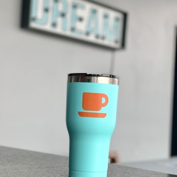 Orange Cup Java Station - a coffee cup on a table - Coffee & Tea Near Me - Galesburg, Illinois Orange Cup Java Station - a coffee cup on a table - Coffee & Tea Near Me - Galesburg, Illinois