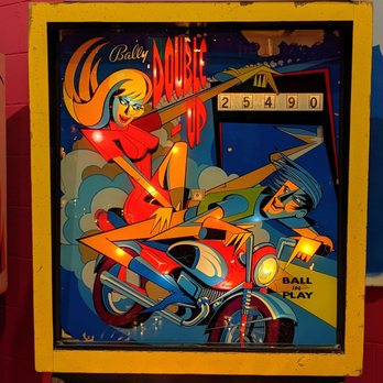 Pacific Pinball Museum - "Pointy-people" room has this style backboard art on all machines - Arcades Near Me - Alameda, California