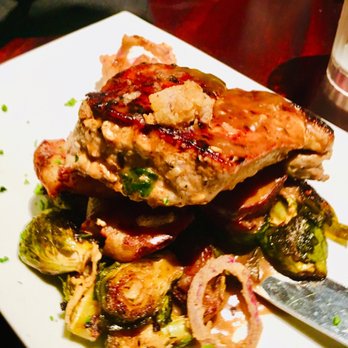 No Frill Bar and Grill - Pork chop with smashed potatoes with Brussel sprouts with gravy. - Wine Bars Near Me - Virginia Beach, Virginia