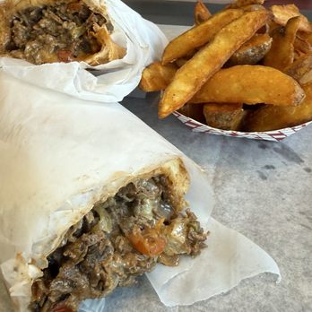 Philly's Famous - Chandler - Mushroom Pepper Cheese Steak with Seasoned Wedges - Sandwiches Near Me - Chandler, Arizona Philly's Famous - Chandler - Mushroom Pepper Cheese Steak with Seasoned Wedges - Sandwiches Near Me - Chandler, Arizona