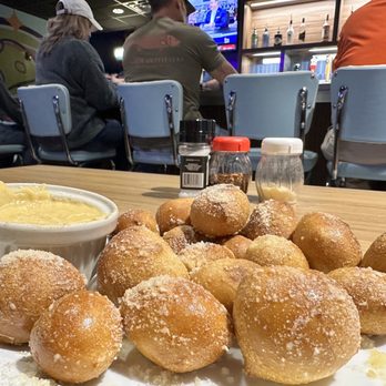 Mellow Mushroom Pike Road - a plate of doughnuts and dipping sauce - Gluten-Free Near Me - Pike Road, Alabama Mellow Mushroom Pike Road - a plate of doughnuts and dipping sauce - Gluten-Free Near Me - Pike Road, Alabama