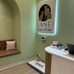 Lane Veterinary - Entrance with logo and a scale to weigh the pets