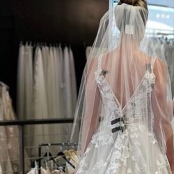 The Altar Bridal Consignment - This is a photo taken at Altar bridal. The associated pinned it up assuring me the alterations person could do this.