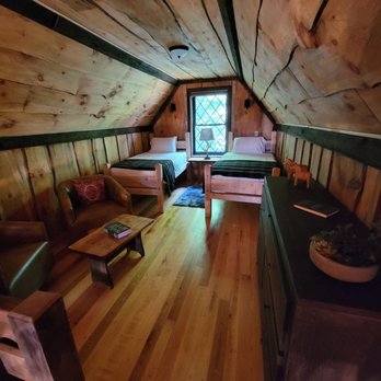 Viking Villages Resorts - Upstairs with two cozy twin beds, a sitting/reading area and a dresser. - Hotels Near Me - Guilford, Vermont Viking Villages Resorts - Upstairs with two cozy twin beds, a sitting/reading area and a dresser. - Hotels Near Me - Guilford, Vermont