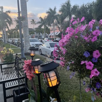 Mediterrano - Outdoor decor is lovely. Flower arrangements and hanging foliage on the patio is gorgeous as well. - Mediterranean Near Me - Naples, Florida Mediterrano - Outdoor decor is lovely. Flower arrangements and hanging foliage on the patio is gorgeous as well. - Mediterranean Near Me - Naples, Florida