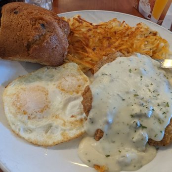 Broken Yolk Cafe - Country Fried Steak, eggs, hash browns, and blueberry muffin. So so yummy and huge! - American Near Me - Temecula, California Broken Yolk Cafe - Country Fried Steak, eggs, hash browns, and blueberry muffin. So so yummy and huge! - American Near Me - Temecula, California