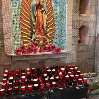 Rosalita's Cantina - the virgin of guadalupe surrounded by candles - Mexican Near Me - Des Peres, Missouri Rosalita's Cantina - the virgin of guadalupe surrounded by candles - Mexican Near Me - Des Peres, Missouri