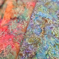 The Quilters' Corner at Middlebury Sew-N-Vac - Drool worthy batiks!! What color do you like better? Pink or Blue? We love both!
