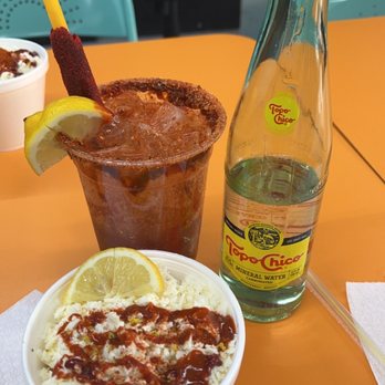 Locos Sabrosos y Picosos - Corn in a cup, topo chico preparado - Mexican Near Me - Houston, Texas