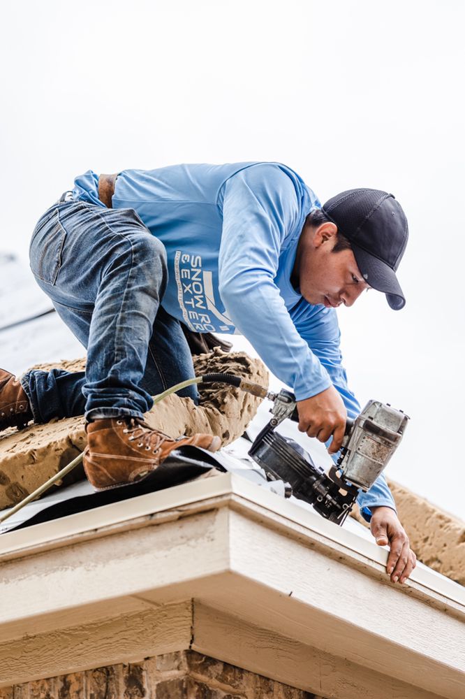 Slide of Snow Roofing and Exteriors