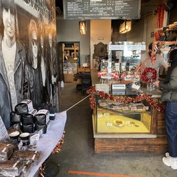 a woman standing in front of the counter