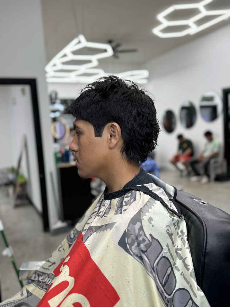 Elevated barber studio Logo