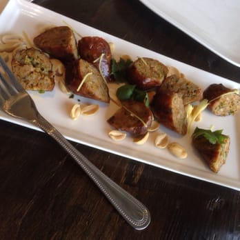 Palm Thai Bistro - Sai Ua (Chang Mai sausage)- Spicy grilled pork sausage.. Flavorful and a good kick.. - Thai Near Me - Fairfield, California Palm Thai Bistro - Sai Ua (Chang Mai sausage)- Spicy grilled pork sausage.. Flavorful and a good kick.. - Thai Near Me - Fairfield, California