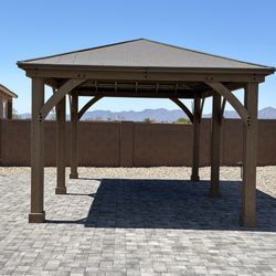 E.C. Landscape & Excavation  - Assembled gazebo from Costco. He installed hidden footers and the construction is solid!