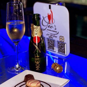 Geo’s Lounge - a glass of wine and a chocolate dessert - Venues & Event Spaces Near Me - Tampa, Florida Geo’s Lounge - a glass of wine and a chocolate dessert - Venues & Event Spaces Near Me - Tampa, Florida
