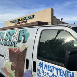 Golden Star Market - Storefront with quirky static display
