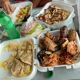 Seafood platter and nachos with cheese and beans. Seafood platter and nachos with cheese and beans.