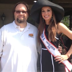 Jimmy Olsen Entertainment - Jimmy with Mrs. Iowa at the Waukee Chamber Golf Outing.