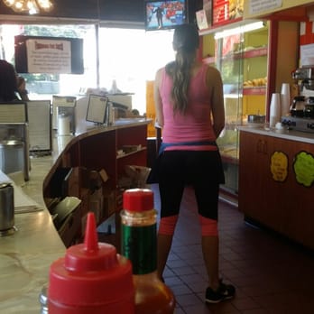 Jack's Donuts - At the counter, watching tv, enjoying breakfast. - Donuts Near Me - Laurel Springs, New Jersey