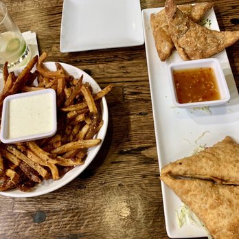 STIR - Spicy chicken samosas and parmesan truffle fries! - Bars Near Me - Raleigh, North Carolina STIR - Spicy chicken samosas and parmesan truffle fries! - Bars Near Me - Raleigh, North Carolina
