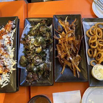 The Sweet Sap - L-r: Tteokbokki, Brussels Brussel Sprouts & Bacon, Maple Glazed Sweet Potato Sticks, Crispy Calamari - New American Near Me - Flushing, New York The Sweet Sap - L-r: Tteokbokki, Brussels Brussel Sprouts & Bacon, Maple Glazed Sweet Potato Sticks, Crispy Calamari - New American Near Me - Flushing, New York