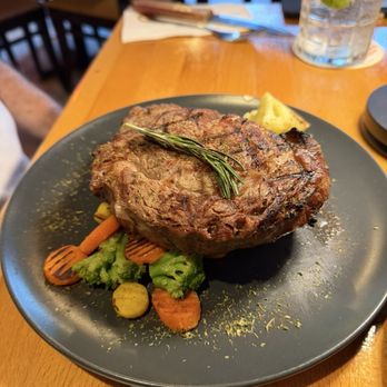 Prime Grill 1302 - New York Strip with grilled vegetables. - Steakhouses Near Me - San Juan, Puerto Rico