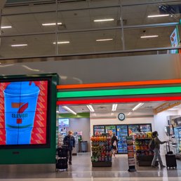 7-Eleven storefront inside Terminal D of the Dallas Fort Worth Airport. 7-Eleven storefront inside Terminal D of the Dallas Fort Worth Airport.