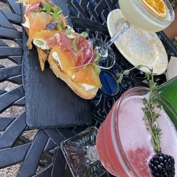 Project Social Kitchen & Bar - Prosciutto Toast w/ Rising Sol Cocktail & Midnight Cocktail - Cocktail Bars Near Me - Bar Harbor, Maine Project Social Kitchen & Bar - Prosciutto Toast w/ Rising Sol Cocktail & Midnight Cocktail - Cocktail Bars Near Me - Bar Harbor, Maine