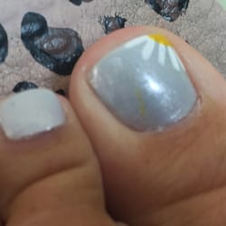 California Nails - Messy paint job. I have left over yellow from the flower on my nail!