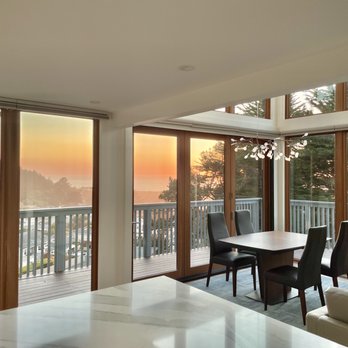 Hawke Construction - a dining room with a view of the ocean - General Contractors Near Me - San Francisco, California Hawke Construction - a dining room with a view of the ocean - General Contractors Near Me - San Francisco, California