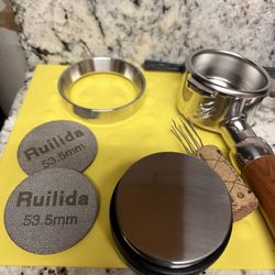 Beanetics Coffee Roasters - The puck filters are cheap on Amazon. 1.7mm thick, 150 microns. Keeps machine clean, pucks solid.