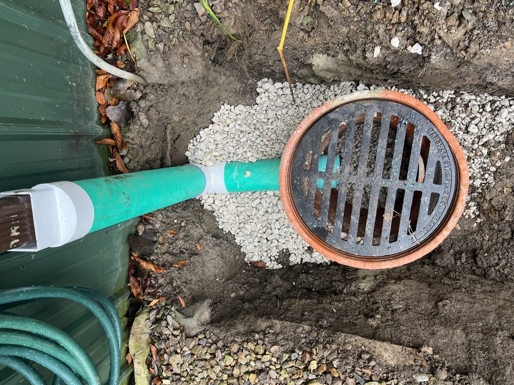 Slide of Dan's Drain Services