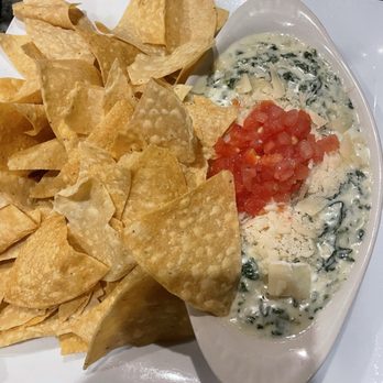 Jonathan's Grille - Spinach and artichoke dip - Sports Bars Near Me - Nashville, Tennessee Jonathan's Grille - Spinach and artichoke dip - Sports Bars Near Me - Nashville, Tennessee