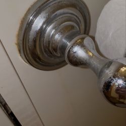 Hatteras Realty - Filth built up on tp holder