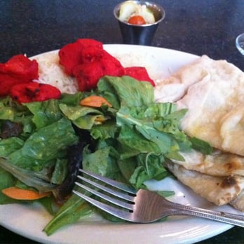 The Oven - Chicken Tikka Naan: Tandoori boneless chicken served with Naan bread. - Indian Near Me - Lincoln, Nebraska The Oven - Chicken Tikka Naan: Tandoori boneless chicken served with Naan bread. - Indian Near Me - Lincoln, Nebraska