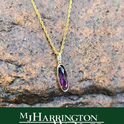 M.J. Harrington Jewelers - Amethyst, diamonds and yellow gold pendant