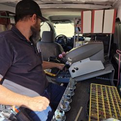 United Lock Service - United Lock Service rekeying locks. Mobile locksmith.