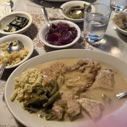 1/2 order Rahmschnitzel with family style sides 1/2 order Rahmschnitzel with family style sides