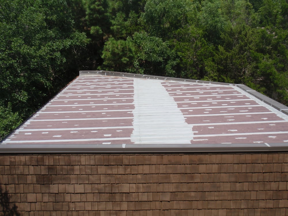 Slide of JCI Roofing Company