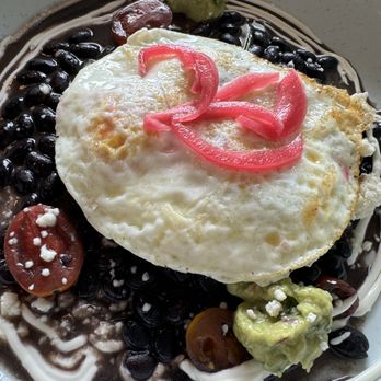 Lime & Cilantro - Black beans bowl with eggs over easy - Latin American Near Me - Silver Spring, Maryland
