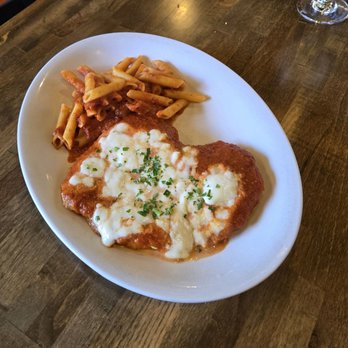 Bella Napoli Pizzeria - Pollo Alla Parmigiana.  This a large portion. I tried it. Very tasty and my wife loved it. Had some leftover to take home. - Italian Near Me - Nashville, Tennessee
