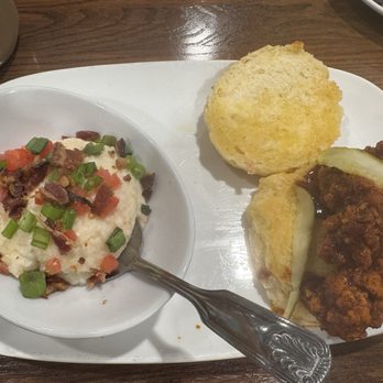 Another Broken Egg Cafe - Nashville Hot Chicken Biscuit Sandwich and a side of city grits - Breakfast & Brunch Near Me - Atlanta, Georgia