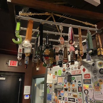 Burnt Barrel - a fire exit sign hanging from the ceiling - Wine Bars Near Me - Youngsville, North Carolina Burnt Barrel - a fire exit sign hanging from the ceiling - Wine Bars Near Me - Youngsville, North Carolina