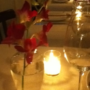Le Colonial - Table setting with live orchids - Vietnamese Near Me - Chicago, Illinois Le Colonial - Table setting with live orchids - Vietnamese Near Me - Chicago, Illinois