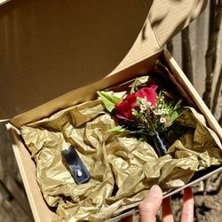 Scarlet Romance Boutonniere package