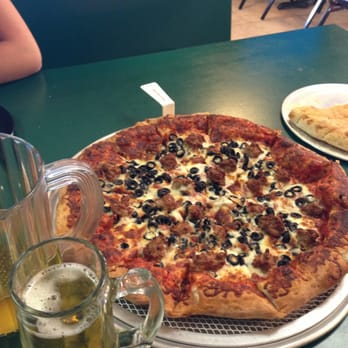 Pizza Factory - Sausage and Olive pizza with a half pitcher of Rolling Rock - Pizza Near Me - Denair, California Pizza Factory - Sausage and Olive pizza with a half pitcher of Rolling Rock - Pizza Near Me - Denair, California