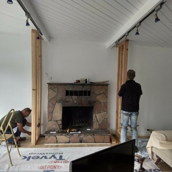 Chucks Construction - Before old stone fireplace. - General Contractors Near Me