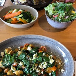 Pumpkin gnocchi (very little pumpkin and extremely oily), steamed veggies (also really oily), Caesar salad, fish and chips in the back.