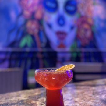Tulum Prime - a cocktail with a slice of orange - New Mexican Cuisine Near Me - Coral Springs, Florida Tulum Prime - a cocktail with a slice of orange - New Mexican Cuisine Near Me - Coral Springs, Florida